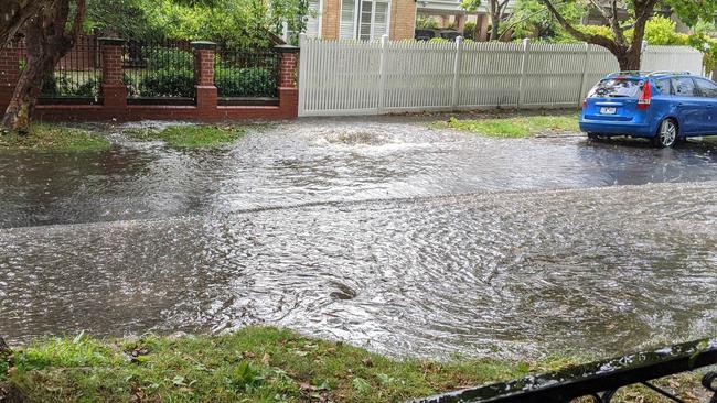 Flooded streets and gutters, like this one in Malvern East, have also seen a spike.