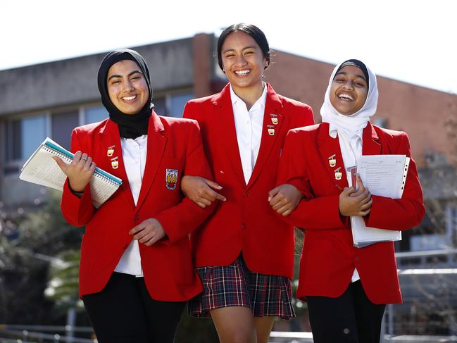 Plumpton High School students (from left) Faqeeha Amal, Jemima Neemia and Nafeesa Rishad are benefiting from a new mentoring program. Picture: Sam Ruttyn