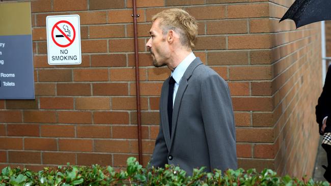 Johns enters court. Picture: Peter Lorimer