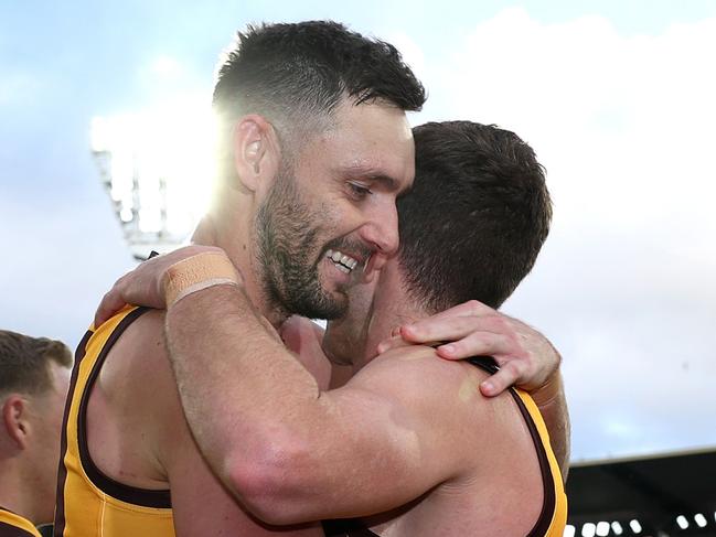 MELBOURNE, AUSTRALIA - JUNE 01: Jack Gunston of the Hawks hugs Luke Breust of the Hawks after winning the round 12 AFL match between Hawthorn Hawks and Adelaide Crows at Melbourne Cricket Ground, on June 01, 2024, in Melbourne, Australia. (Photo by Quinn Rooney/Getty Images)