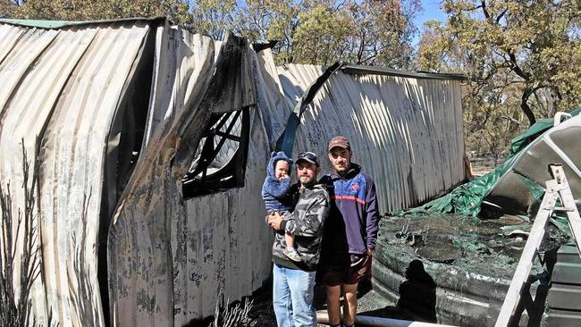 Peter Patti with sons Brock and Cruze. The Patti's are lucky to have a house still with one family member calling it 'a miracle'. Picture: Contributed