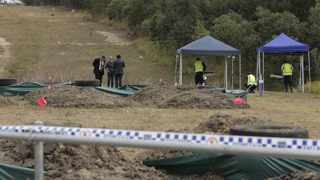 Homicide detectives with assistance from forensic officers and Southern Region Police excavate land in Cobalt Street, Carole Park regarding the suspected murder of Sharron Phillips in 1986. Picture: Adam Armstrong