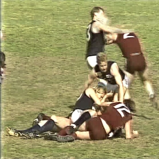 Wodonga and Lavington players punch on in the 1990 Bloodbath grand final in the Ovens and Murray.