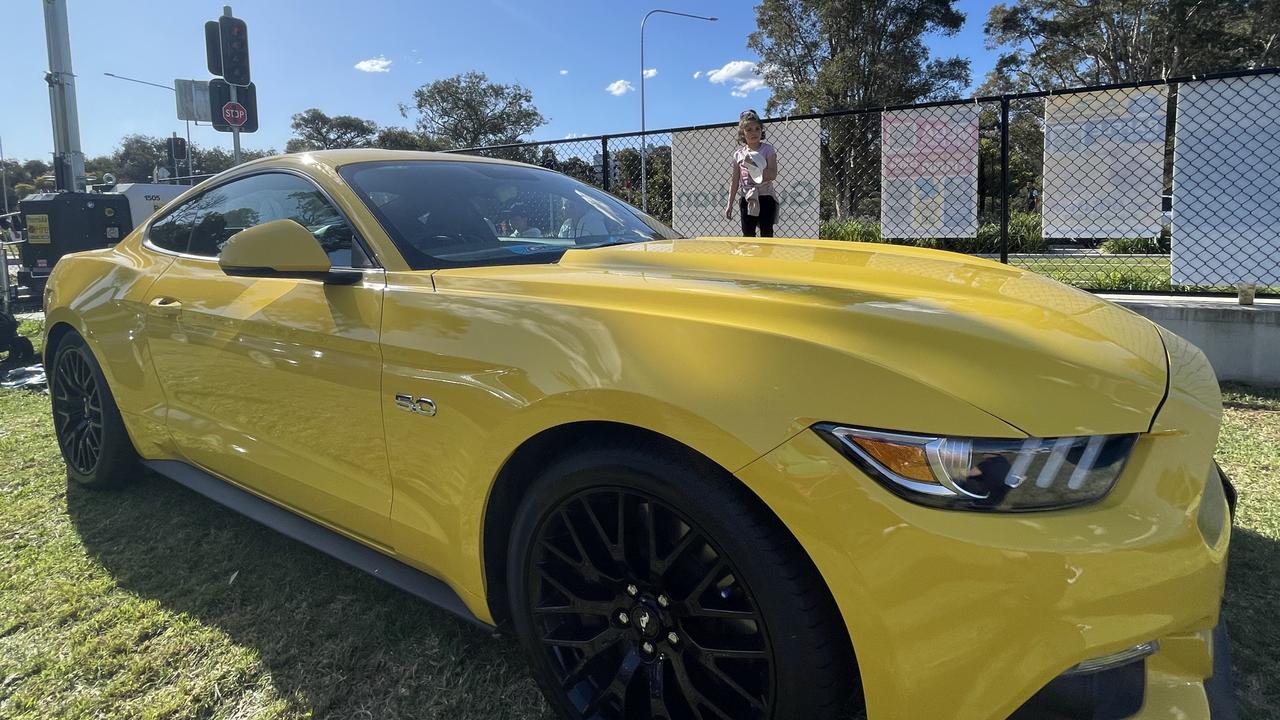 The Tambourantzis family's yellow 2018 GT Mustang on display at the Let's Go Greek Festival.