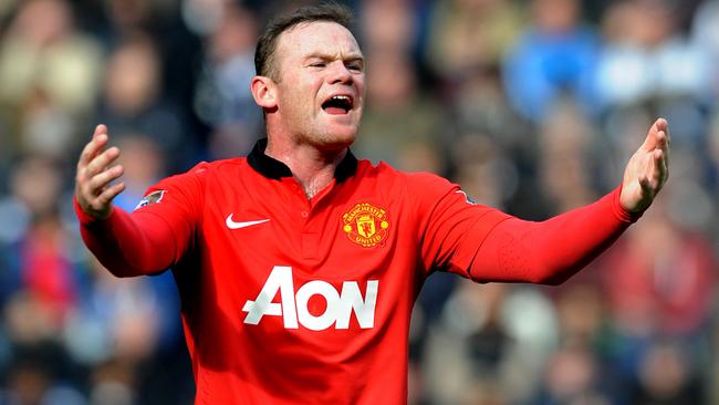 Man United forward Wayne Rooney shown wearing the Nike shirt worn last season.