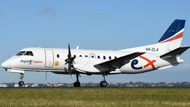 A Rex SAAB 340 at Sydney Airport. Pilots will vote on a series of work bans this week, including four-hour stoppages, in an effort to secure a better deal. Picture: AAP