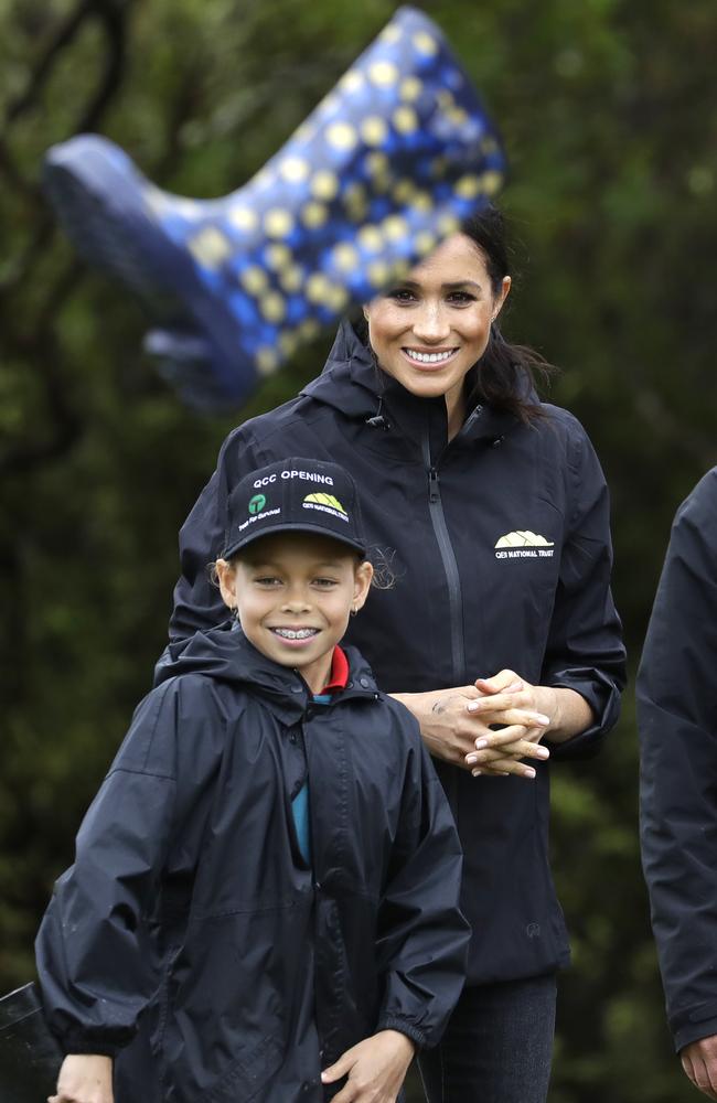 The Duchess was all smiles as she spoke with children from the Trees in Survival group. Picture: AP