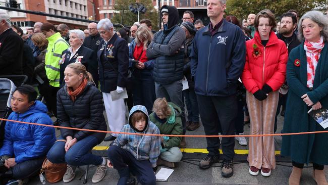 People of all ages were seen paying their respects, from toddlers to army veterans. Picture: Russell Millard