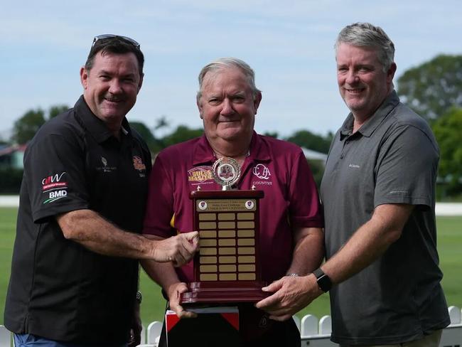 Jimmy Maher, Kev Maher and Martin Love (l-r) holding the 2024 Jimmy Maher-Martin Love Cup. Source: Queensland Country Cricket Facebook