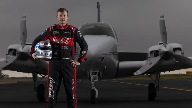 Supercars driver and pilot Will Brown from Erebus Motorsport with his plane at Toowoomba Airport. Picture: Mark Horsburgh