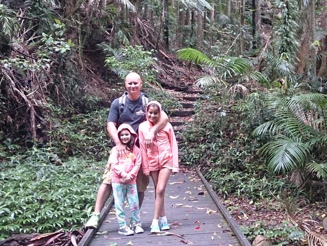 KINGSCLIFF, NSW .. for Mercedes Maguire story .. Shane, Ava (10) and Evie (5) Maguire at Mount Warning on the Tweed Coast