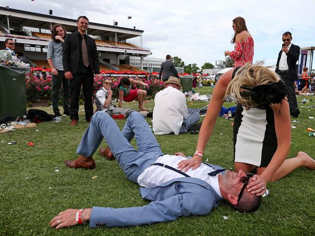 Melbourne Cup Day 2014 at Flemington Racecourse. Punters start to get a little raucous after the cup. Picture: Mark Stewart