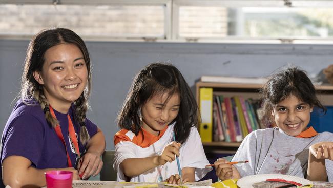 Left to right: Educator Jess Lei, Caitlin Wang, 7, &amp; Zebia Jasim, 7, pose for a photo at Inspire Carlingford, which has an excellent rating. Picture: NCA NewsWire/ Monique Harmer