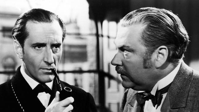 Basil Rathbone (left) as Holmes and Nigel Bruce as Watson in a scene from 1939’s The Adventures of Sherlock Holmes.