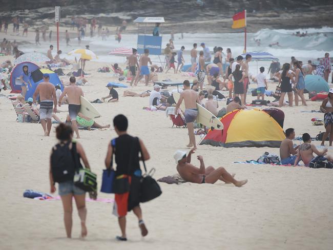 Thousands of people have flocked to beaches the last few days due to soaring temperatures, but officials have advised people to be extra careful after 10 people have gone missing or drowned since Christmas. Picture: Daniel Aarons