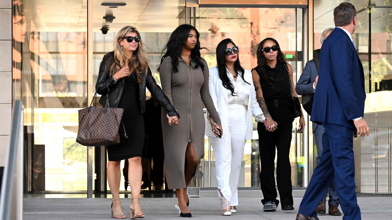 Vanessa Bryant leaves court with her daughter Natalia Bryant and close friend Sydney Leroux. Photo by Patrick T. FALLON / AFP.