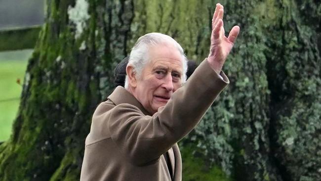 Britain's King Charles III and Britain's Queen Camilla (hidden) arrive at St Mary Magdalene Church on the Sandringham Estate in eastern England on February 11, 2024. Britain's King Charles III on Saturday expressed his "heartfelt thanks" to well-wishers, in his first statement since his shock announcement that he has cancer. (Photo by JUSTIN TALLIS / AFP)