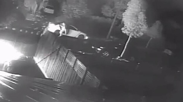 The moment gunmen opened fire on the home of Finks bikie boss Brent James Reker and set fire to a car outside his house.