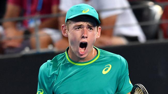 Alex de Minaur of Australia celebrates winning a point during his first round match against Steve Johnson of the USA at the Brisbane International Tennis Tournament in Brisbane, Sunday, December 31, 2017. (AAP Image/Darren England) NO ARCHIVING, EDITORIAL USE ONLY