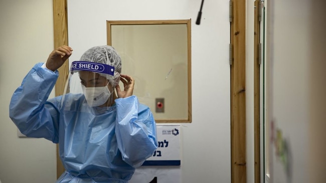 A health workers is seen as Israelis receive the third doses of Covid-19 vaccines at Shaare Zedek Medical Center in West Jerusalem on September 03. Picture: Mostafa Alkharouf/Anadolu Agency via Getty Images