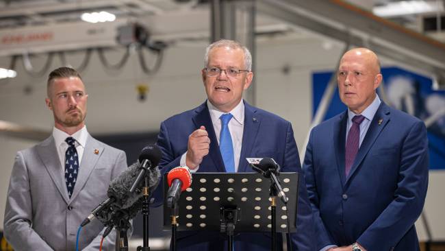 Prime Minister Scott Morrison and Defence Minister Peter Dutton at a press conference on Friday with LNP Candidate for Blair Sam Biggins. Picture: Jason Edwards