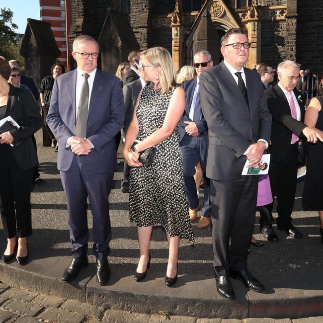 Anthony Albanese, left, Jacinta Allan and Daniel Andrews outside the cathedral after Kimberley Kitching’s funeral. Picture: David Caird