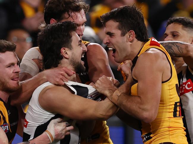 MELBOURNE, AUSTRALIA - August 5 , 2023. AFL .        Josh Daicos of the Magpies and Finn Maginness of the Hawks go at it during the round 21 match between the Hawthorn and Collingwood at Marvel Stadium in Melbourne.   Photo by Michael Klein.