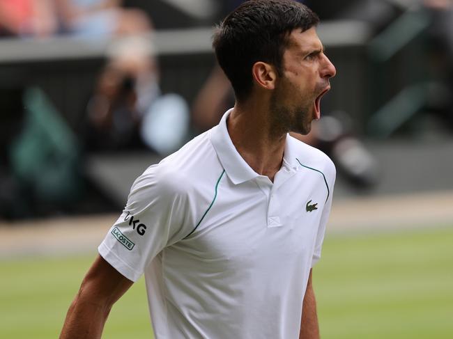 LONDON, ENGLAND - JULY 11: Novak Djokovic of Serbia celebrates during his men's Singles Final match against Matteo Berrettini of Italy on Day Thirteen of The Championships - Wimbledon 2021 at All England Lawn Tennis and Croquet Club on July 11, 2021 in London, England. (Photo by Clive Brunskill/Getty Images)