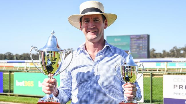 Ciaron Maher with the Bendigo Cup. Picture: Brett Holburt/Racing Photos via Getty Images