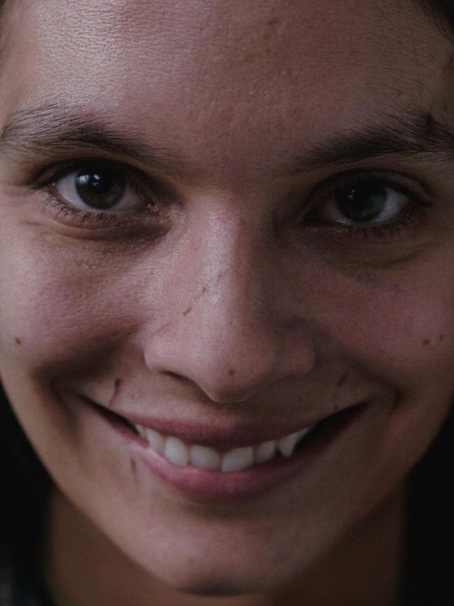 Caitlin Stasey plays Laura Weaver in Smile.
