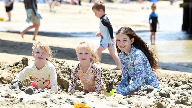 Sisters Alannah, Tiffany and Amberly at Barwon Heads beach. Picture: David Smith.