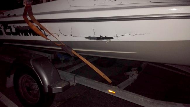 A picture of the damage caused to the boat by the crash.