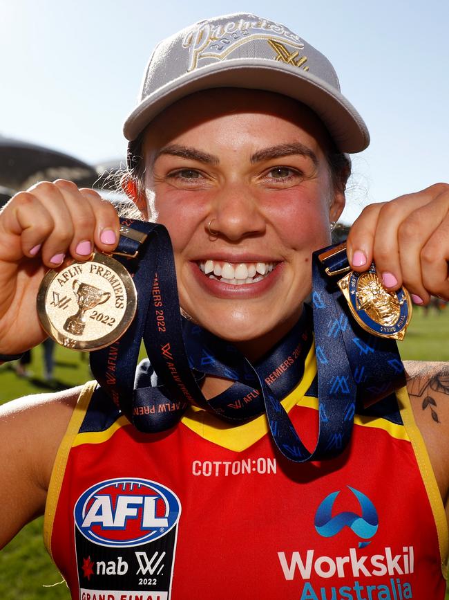 Anne Hatchard of the Crows poses for a photo with her Best On Ground medal and her Premiership Medal. Picture: Dylan Burns