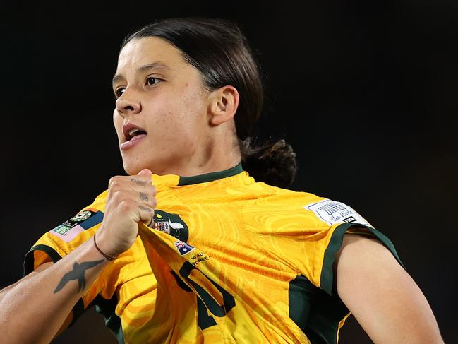 SYDNEY, AUSTRALIA - AUGUST 16: Sam Kerr of Australia celebrates after scoring her team's first goal  during the FIFA Women's World Cup Australia & New Zealand 2023 Semi Final match between Australia and England at Stadium Australia on August 16, 2023 in Sydney, Australia. (Photo by Brendon Thorne/Getty Images)