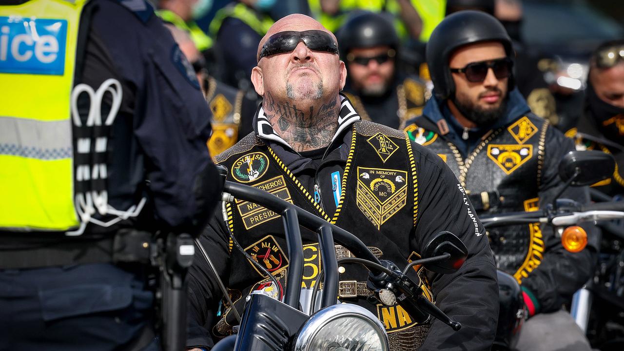 Comanchero President Mick Murray has the word “ruthless” tattooed across his neck. Picture: Ian Currie