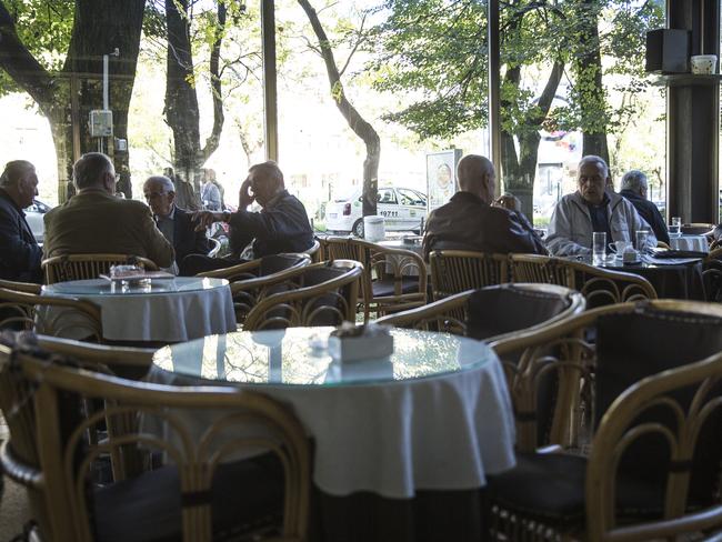 Talking business ... The cafe in Montenegro where the main players discuss drug deliveries. Note the men in this photo are not accused of any criminal activity. Picture: Ella Pellegrini