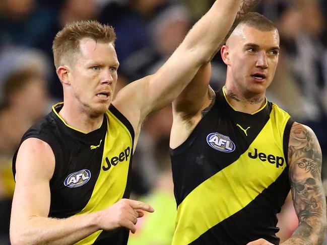 MELBOURNE, AUSTRALIA - AUGUST 03:  Jack Riewoldt of the Tigers celebrates after kicking a goal with Dustin Martin of the Tigers during the round 20 AFL match between the Richmond Tigers and the Geelong Cats at Melbourne Cricket Ground on August 3, 2018 in Melbourne, Australia.  (Photo by Scott Barbour/Getty Images)