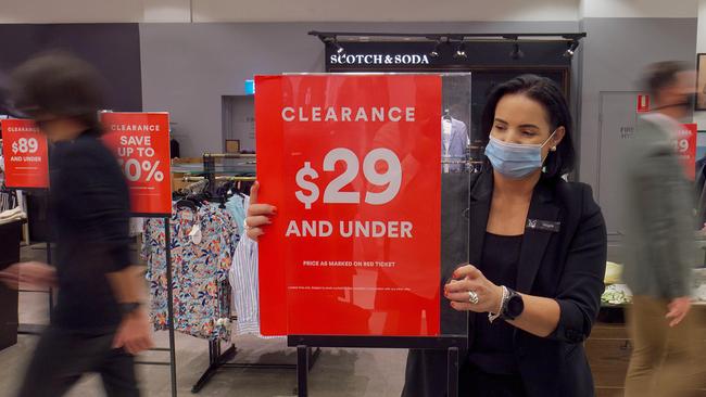 At the David Jones store in Melbourne’s Bourke Street mall, sales staff are rushing around serving customers and preparing for the weekend’s onslaught as big sales kick off. Photo: Luis Enrique Ascui