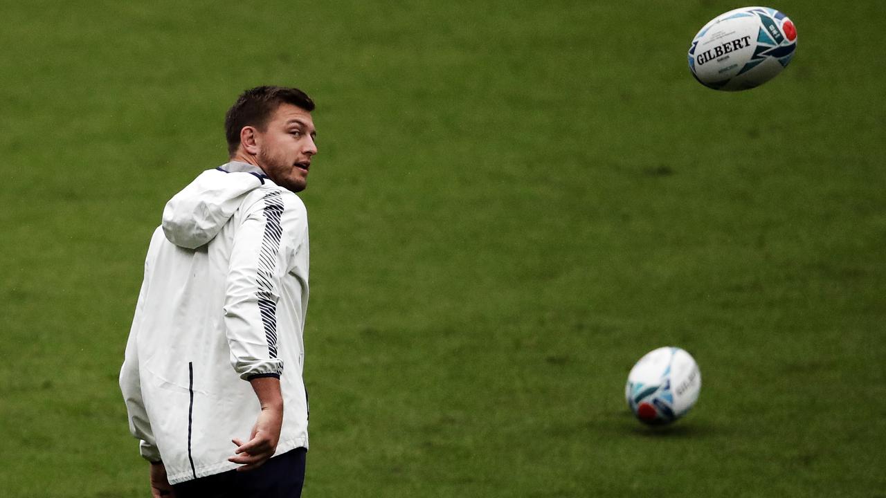 South Africa's Handre Pollard eyes the ball during a training session in Yokohama.