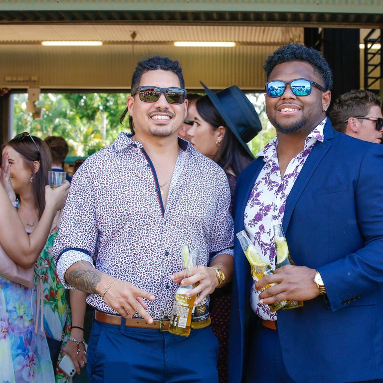 Roy DaCosta (L) and Levi Tiko as punters enjoy the Great Northern Darwin Cup Picture GLENN CAMPBELL