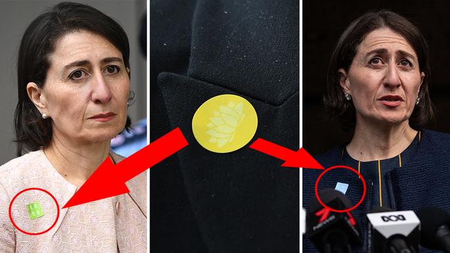 The colour-coded stickers being sported by Gladys Berejiklian.