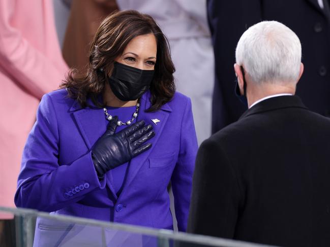 Kamala Harris greets Vice President Mike Pence as she arrives to the inauguration. Picture: Getty Images