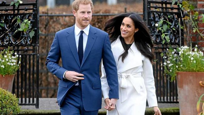 Prince Harry and fiancee Meghan Markle - 15 years and a lifetime since the young prince&#39;s visit to Sunshine Beach. Picture: FACUNDO ARRIZABALAGA