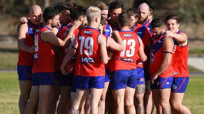 Mernda players come together before a Northern Football League game this season. Picture: Nathan McNeill