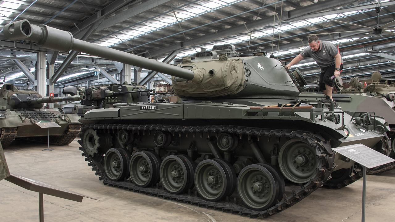 Even if there are no tourists around, the military tanks and other artillery hardware still need cleaning. Jason Belgrave, assistant manager of the Australian Armour Artillery Museum in Cairns, is tasked with keeping the weapons of war in the best condition. The museum, which relies heavily on interstate and overseas tourists and enthusiasts, has been hit hard by Covid. But, after closing for a period during the lockdown, they are now open again. Picture: Brian Cassey