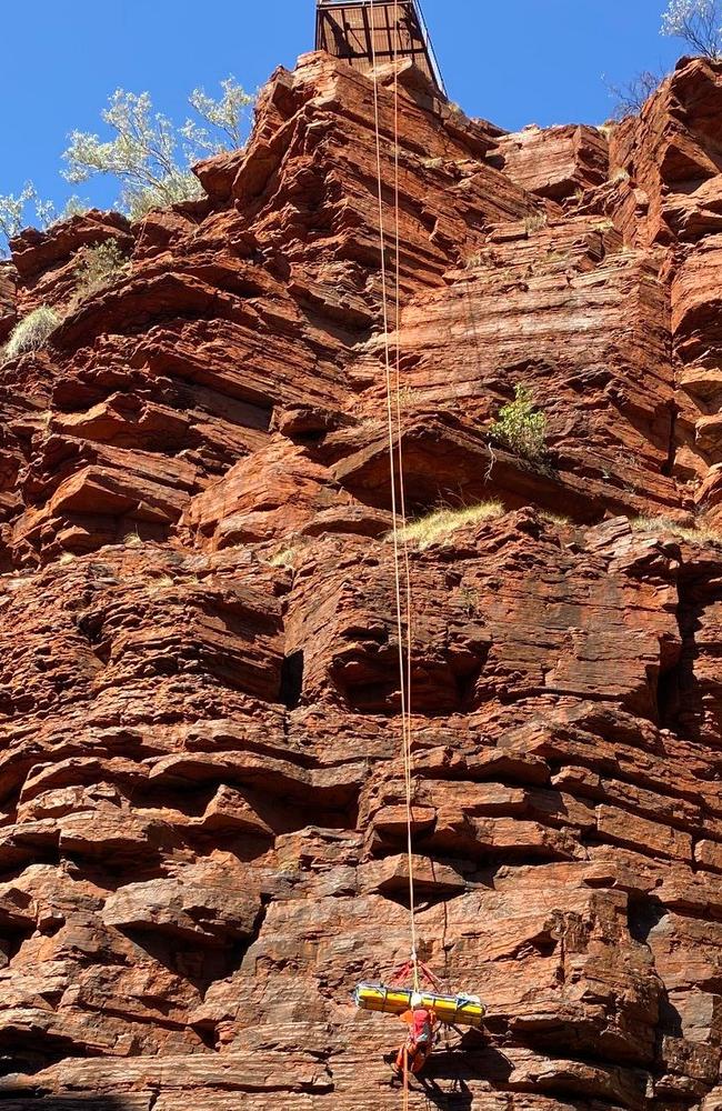 Local rangers helped winch the seven-year-old to safety after he slipped and fell into the gorge.