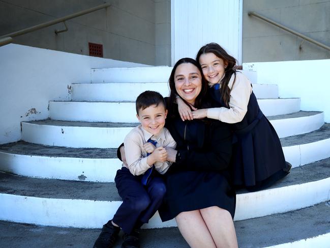 20/09/2018: Prime Minister Scott Morrison has announced billions of dollars in extra funding for independent and Catholic schools. (L-R) Lisa Maletta with her children Olivia, 8 and Sebastian, 6. at St Fiacre's Catholic Primary School in Leichhardt. Hollie Adams/The Australian