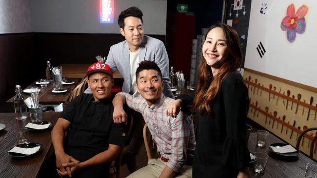 Hae-Ah Lee, Steven Lee, Jang-Hoon Choi and Hyun-Woo Kang at their Plus 82 Pocha diner in the city. Picture: Calum Robertson