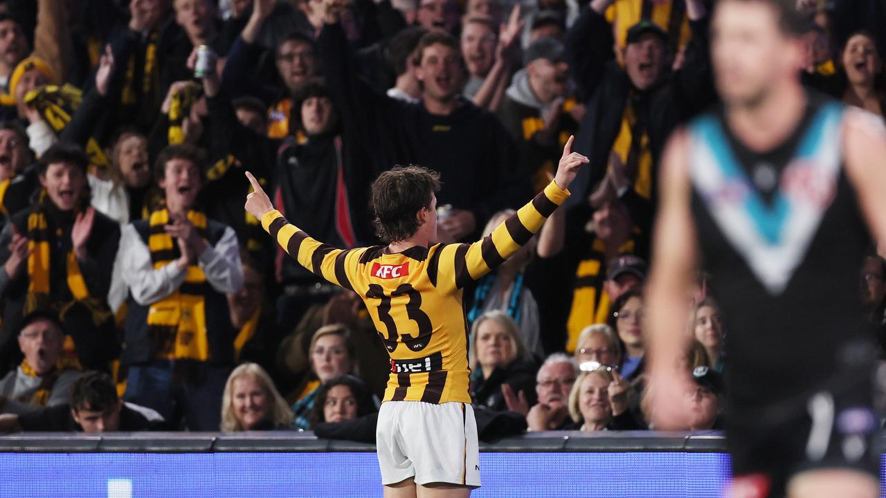 Ginnivan celebrates a goal against Port. Photo by James Elsby/AFL Photos via Getty Images