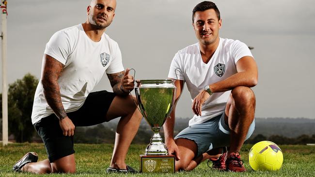 Co-founders Robby Mansour and Alex Cauchi with the Marc Arcuri Cup.